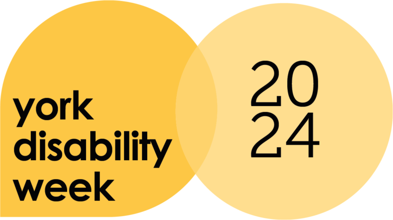 The image is a logo for York Disability Week 2024. It features two overlapping circular shapes. The left circle is larger and a rich yellow colour, with the text "york disability week" written in bold, lowercase black letters. The right circle is smaller, a lighter yellow, and contains the numbers "2024" in a modern, black font. The overlapping portion of the circles blends the two shades of yellow, creating a subtle visual connection between the text and the year.