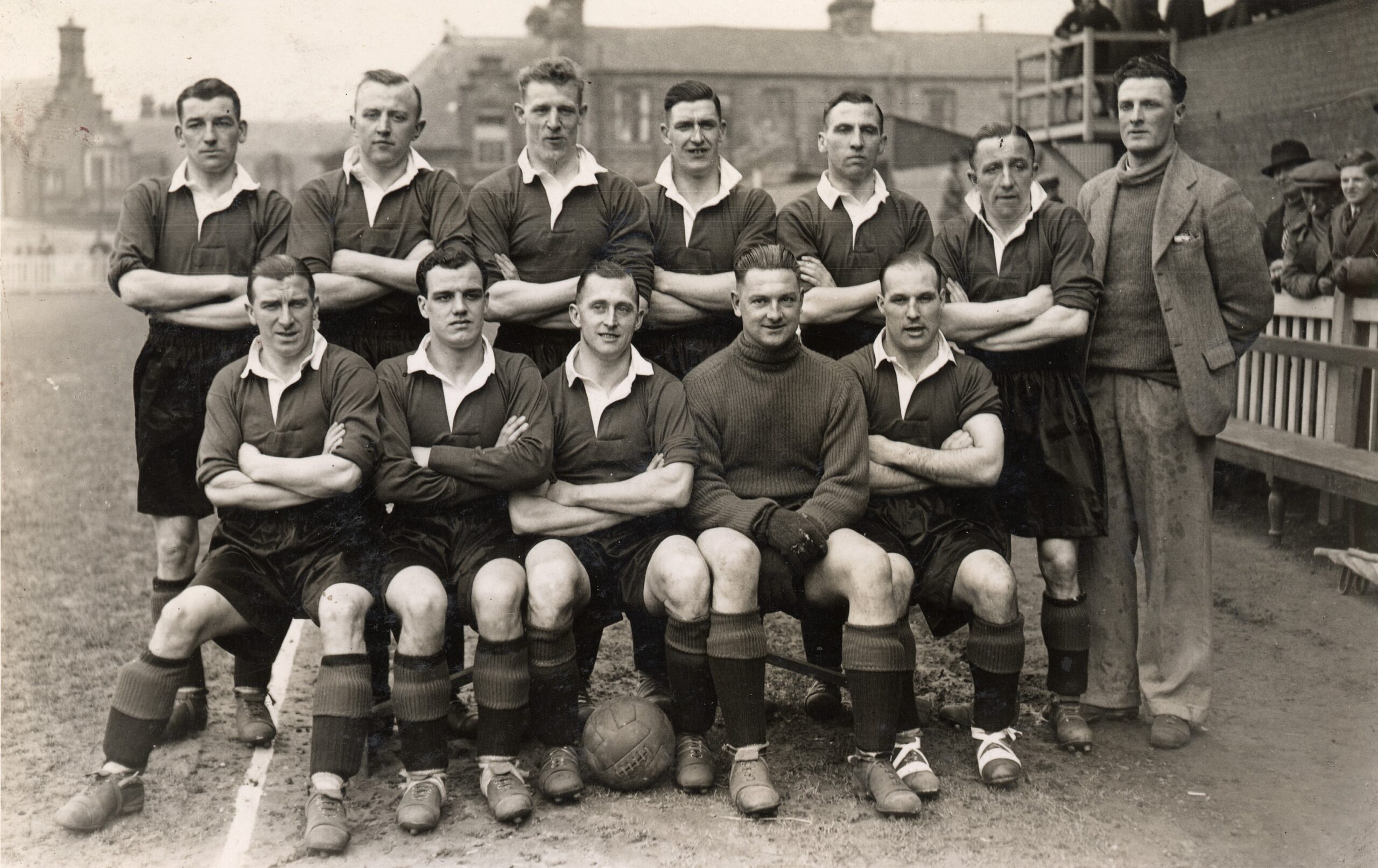 Football team posing at their ground