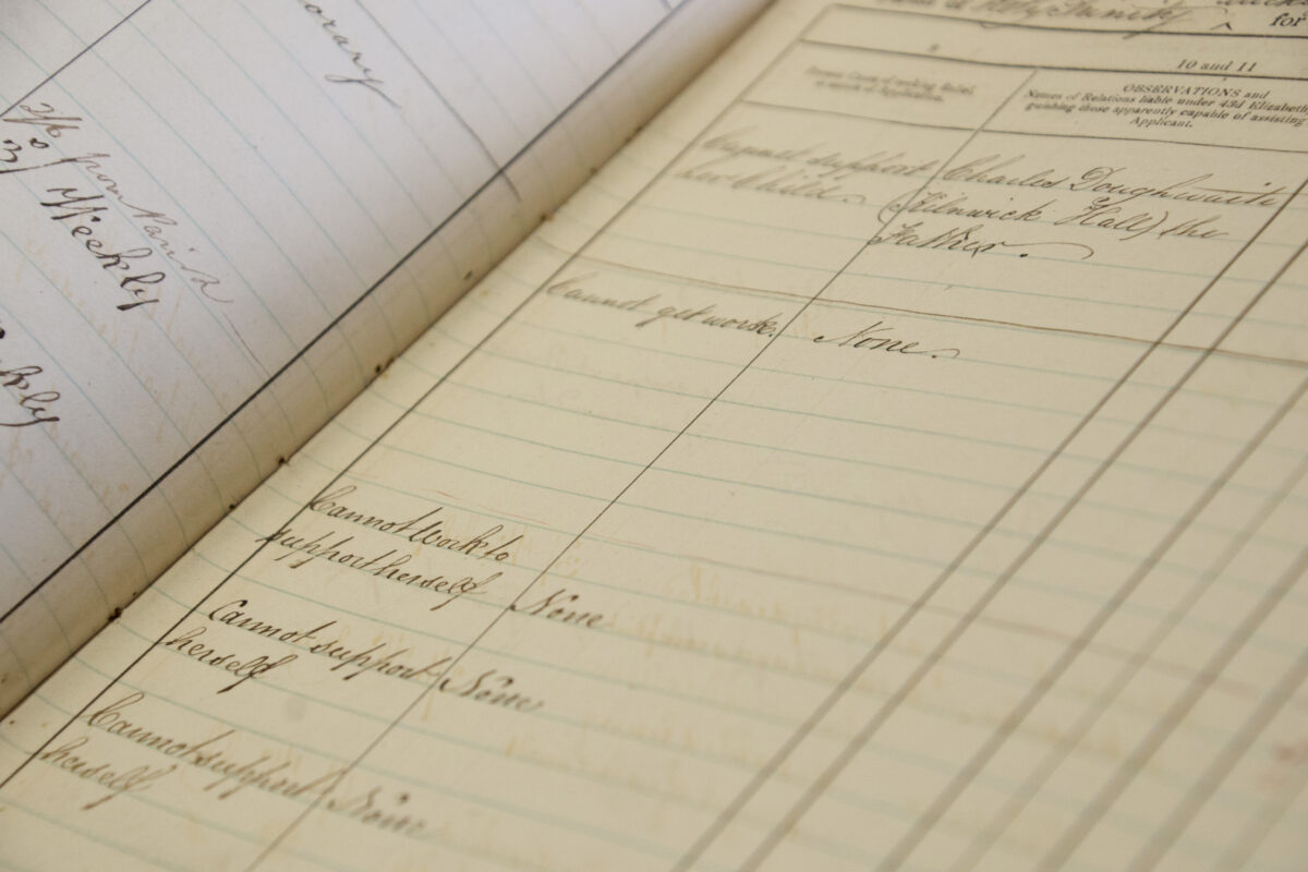 Handwritten entries in a book