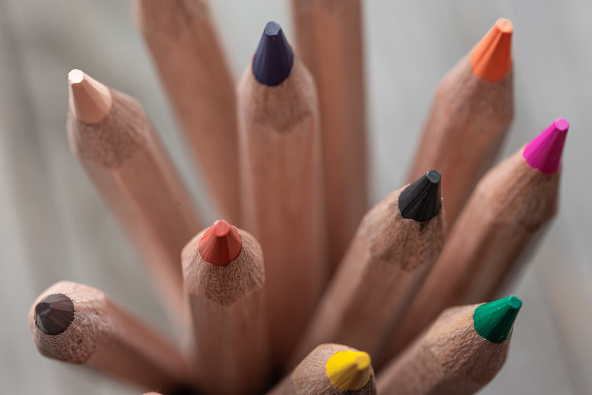 A close up photograph of some colourful pencils.